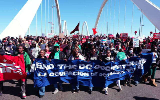 People march across the Frederick Douglass Bridge during the 'No Kings' national day of protest in Washington, DC, on March 28, 2026. (Aaron Schwartz / AFP) People march across the Frederick Douglass Bridge during the 'No Kings' national day of protest in Washington, DC, on March 28, 2026. (Aaron Schwartz / AFP)