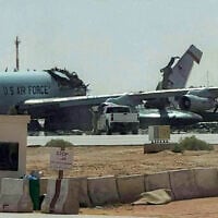 This UGC image posted on social media on March 29, 2026 and verified by AFP staff appears to show a destroyed US Air Force Airborne Warning and Control System (AWACS) aircraft, primarily used for air traffic control, in the aftermath of a projectile strike at Prince Sultan Airbase in Saudi Arabia. (UGC / AFP)