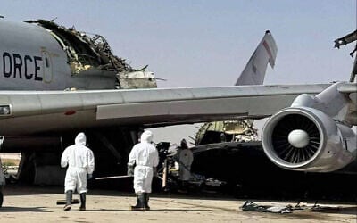This UGC image posted on social media on March 29, 2026, and verified by AFP staff appears to show a destroyed US Air Force Airborne Warning and Control System (AWACS) aircraft, primarily used for air traffic control, in the aftermath of a projectile strike at Prince Sultan Airbase in Saudi Arabia. (UGC / AFP)