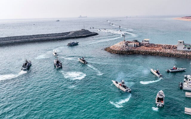 In this photo released August 2, 2023, by Sepahnews of the Iranian Revolutionary Guard, the Guard's speedboats move during a drill on disputed islands in the Persian Gulf. (Sepahnews via AP)