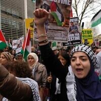 Pro-Palestinian, anti-Israel protesters take part at a demonstration on Al Quds Day, in London, April 5, 2024 (AP Photo/Kin Cheung)