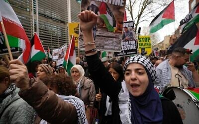 Pro-Palestinian, anti-Israel protesters take part at a demonstration on Al Quds Day, in London, April 5, 2024 (AP Photo/Kin Cheung)