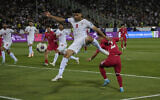Iran's Mehdi Taremi shoots the ball during the 2026 World Cup Asian qualifier group A soccer match between Iran and North Korea, at Azadi Stadium in Tehran, Iran, June 10, 2025. (AP Photo/Vahid Salemi)