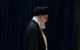 Iranian Supreme Leader Ayatollah Ali Khamenei leaves after casting his vote during the presidential election in Tehran, Iran, June 28, 2024. (AP/Vahid Salemi)