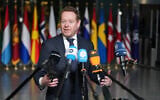 Netherland's Foreign Minister David van Weel speaks with the media as he arrives for a meeting of NATO foreign ministers at NATO headquarters in Brussels, on December 3, 2025. (AP Photo/Virginia Mayo)