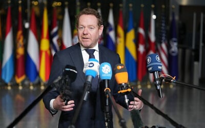 Netherland's Foreign Minister David van Weel speaks with the media as he arrives for a meeting of NATO foreign ministers at NATO headquarters in Brussels, on December 3, 2025. (AP Photo/Virginia Mayo)