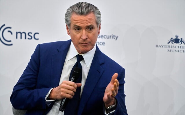 Illustrative: California Gov. Gavin Newsom addresses the audience at the Munich Security Conference in Munich, Germany, February 13, 2026. (Michael Probst/AP)