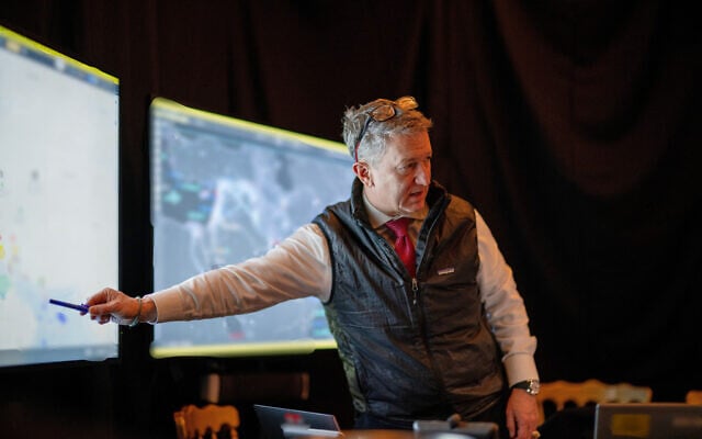 This photo provided by the White House, which has been partially blurred, shows Chairman of the Joint Chiefs of Staff Gen. Dan Caine talking at Mar-a-Lago in Palm Beach, Florida, as US President Donald Trump monitors Operation Epic Fury on February 28, 2026. (Daniel Torok/The White House via AP)