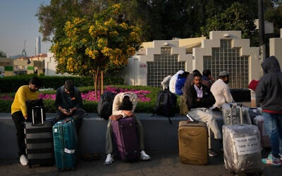 Passengers stranded by the closure of Dubai International Airport await assistance in the airport parking lot in Dubai, United Arab Emirates, March 1, 2026. (AP/Altaf Qadri) Passengers stranded by the closure of Dubai International Airport await assistance in the airport parking lot in Dubai, United Arab Emirates, March 1, 2026. (AP/Altaf Qadri)