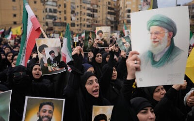 Hezbollah supporters shout slogans as they gather to mourn the death of Iranian Supreme Leader Ayatollah Ali Khamenei in the southern suburb of Beirut, Lebanon, March 1, 2026. (Hassan Ammar/AP)