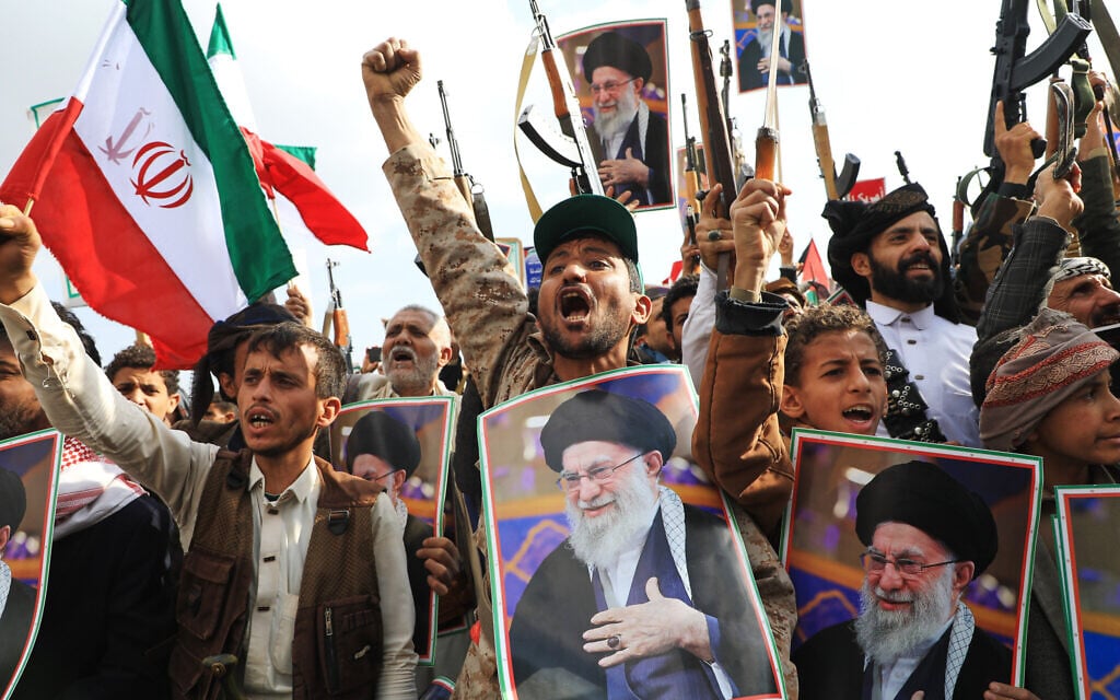 Houthi supporters hold posters of the slain Iranian supreme leader Ayatollah Ali Khamenei and Iranian flags during a rally against Israel and the United States in Sanaa, Yemen, on March 1, 2026. (AP Photo/Osamah Abdulrahman)