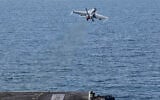 This image provided by US Central Command shows a F/A-18E Super Hornet launching from the USS Abraham Lincoln (CVN 72) for a mission in support of Operation Epic Fury, February 28, 2026. (US Navy via AP)