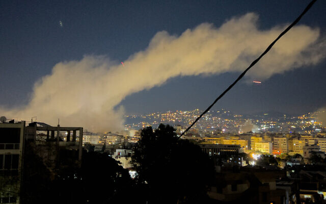 Smoke rises from Israeli airstrikes on Beirut's southern Dahiyeh district, early March 2, 2026. (AP Photo/Hussein Malla)bbbb  new