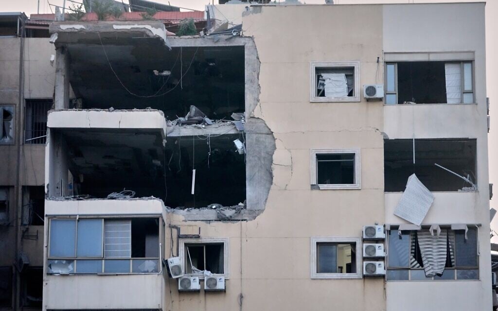 A damaged apartment building is seen following an Israeli airstrike in Dahiyeh, Beirut's southern suburb, Monday, March 2, 2026. (AP Photo/Hussein Malla)