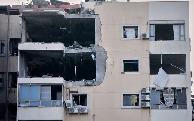 A damaged apartment building is seen following an Israeli airstrike in Dahiyeh, Beirut's southern suburb, Monday, March 2, 2026. (AP Photo/Hussein Malla)