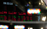 Financial data is displayed on the floor at the New York Stock Exchange in New York, March 2, 2026. (AP/Seth Wenig)