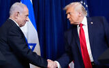 US President Donald Trump, right, shakes hands with Prime Minister Benjamin Netanyahu during a news conference at Mar-a-Lago, in Palm Beach, Florida, December 29, 2025. (Alex Brandon/AP)