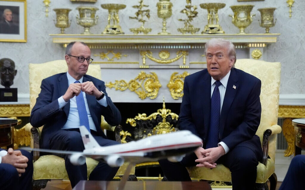 US President Donald Trump meets with German Chancellor Friedrich Merz in the Oval Office at the White House, March 3, 2026, in Washington, DC. (AP Photo/Mark Schiefelbein)