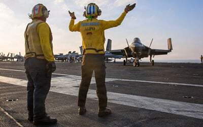 This image provided by US Central Command shows Navy sailors signaling to at F-35C Lightning II on the flight deck of the USS Abraham Lincoln (CVN 72) during operations in support of the war in Iran, on March 3, 2026. (US Navy via AP) This image provided by US Central Command shows Navy sailors signaling to at F-35C Lightning II on the flight deck of the USS Abraham Lincoln (CVN 72) during operations in support of the war in Iran, on March 3, 2026. (US Navy via AP)