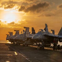 This handout image shows aircraft on the flight deck of the USS Abraham Lincoln (CVN 72) that are operating in support of the war in Iran, March 3, 2026. (US Navy via AP)