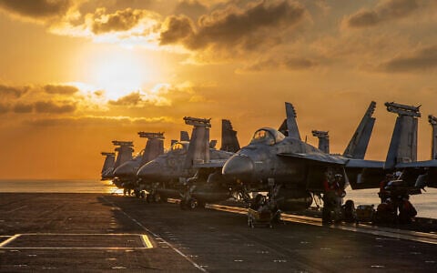 This handout image shows aircraft on the flight deck of the USS Abraham Lincoln (CVN 72) that are operating in support of the war in Iran, March 3, 2026. (US Navy via AP)