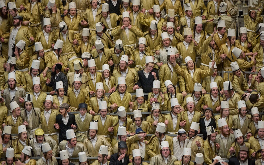 Ultra-Orthodox Jewish men celebrate the festival of Purim in Jerusalem, amid the war with Iran, March 4, 2026. (AP Photo/Ohad Zwigenberg)