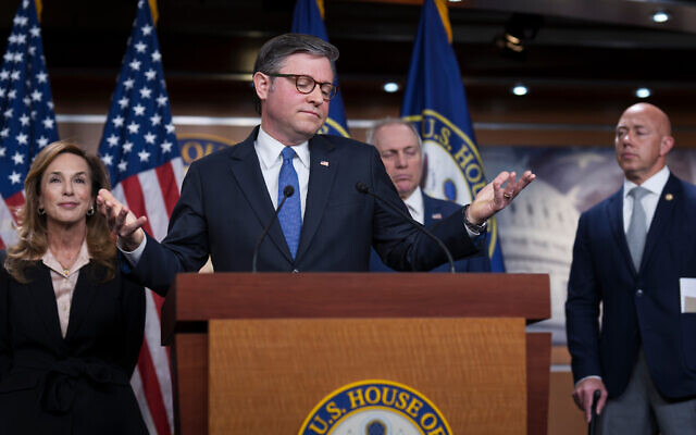 Speaker of the House Mike Johnson, R-La., gestures as he and the GOP leadership talk about the war against Iran, during a news conference at the Capitol in Washington on March 4, 2026. (AP Photo/J. Scott Applewhite)