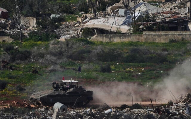 An Israeli APC maneuvers in southern Lebanon, as seen from northern Israel, Thursday, March 5, 2026. (AP/Ariel Schalit) An Israeli APC maneuvers in southern Lebanon, as seen from northern Israel, Thursday, March 5, 2026. (AP/Ariel Schalit)