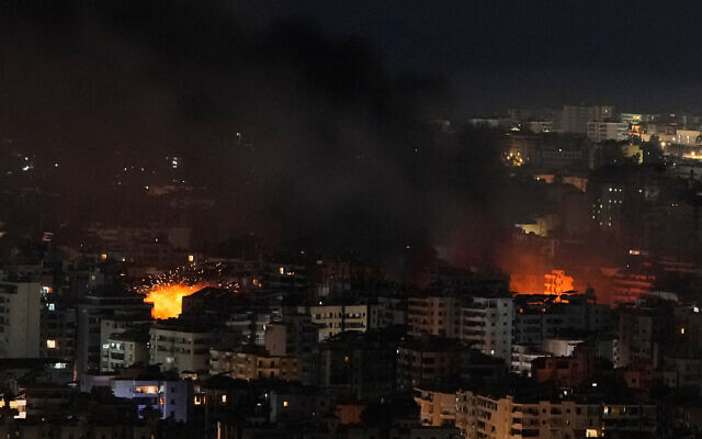 Flames and smoke rise from the site of Israeli airstrikes in Dahiyeh, Beirut's southern suburbs, Lebanon, March 6, 2026. (AP Photo/Hassan Ammar)