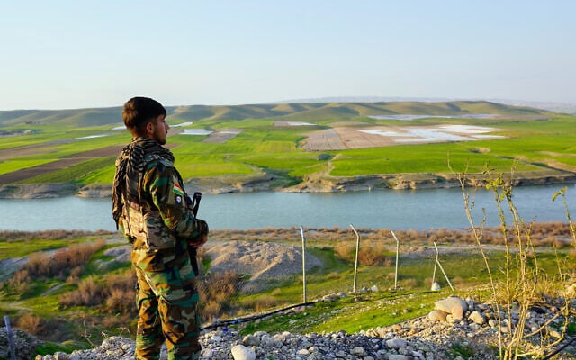 A member of the Kurdistan Freedom Party PAK, stand guard in Irbil, Iraq, March 5, 2026. (AP Photo/Rashid Yahya) A member of the Kurdistan Freedom Party PAK, stand guard in Irbil, Iraq, March 5, 2026. (AP Photo/Rashid Yahya)