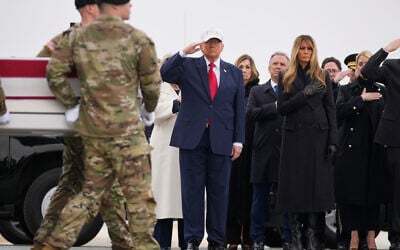 A US Army carry team moves a flag-draped transfer case with the remains of US Army Reserve soldier Sgt. 1st Class Nicole Amor, of White Bear Lake, Minn., who was killed in a drone strike at a command center in Kuwait after the US and Israel launched its military campaign against Iran, past President Donald Trump and first lady Melania Trump during a casualty return, Saturday, March 7, 2026, at Dover Air Force Base, Delaware. (AP Photo/Mark Schiefelbein) A US Army carry team moves a flag-draped transfer case with the remains of US Army Reserve soldier Sgt. 1st Class Nicole Amor, of White Bear Lake, Minn., who was killed in a drone strike at a command center in Kuwait after the US and Israel launched its military campaign against Iran, past President Donald Trump and first lady Melania Trump during a casualty return, Saturday, March 7, 2026, at Dover Air Force Base, Delaware. (AP Photo/Mark Schiefelbein)