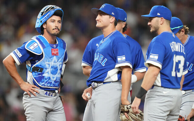 Israel pitcher Ben Simon, second from left, stands on the mound before being relieved during the first inning of a World Baseball Classic game against Venezuela, March 7, 2026, in Miami. (AP Photo/Lynne Sladky) Israel pitcher Ben Simon, second from left, stands on the mound before being relieved during the first inning of a World Baseball Classic game against Venezuela, March 7, 2026, in Miami. (AP Photo/Lynne Sladky)
