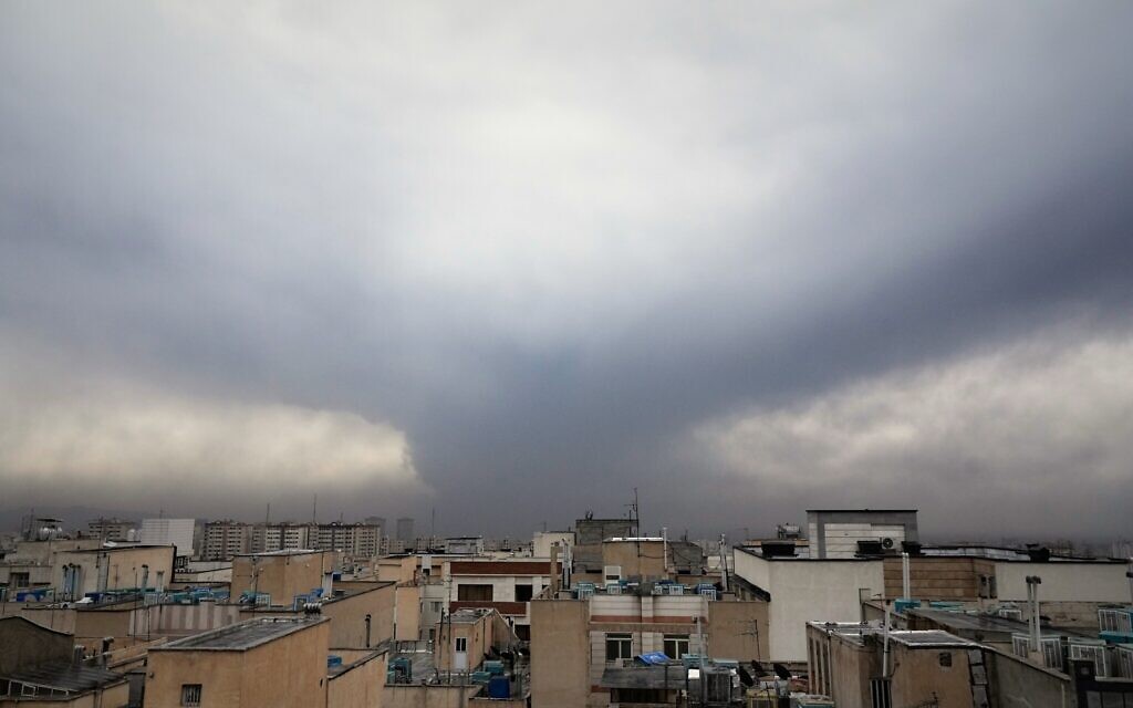 Black clouds over Tehran rain down oil drops after Israel strikes oil facilities
