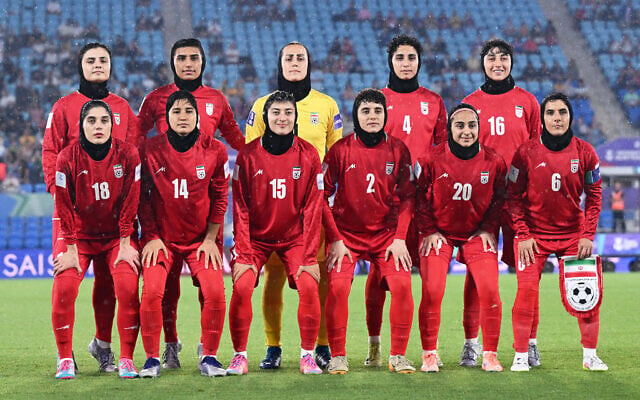 Iran players pose for a team photo ahead of the Women's Asian Cup soccer match between Iran and the Philippines in Robina, Australia, on March 8, 2026. (Dave Hunt/AAP Image via AP) Iran players pose for a team photo ahead of the Women's Asian Cup soccer match between Iran and the Philippines in Robina, Australia, on March 8, 2026. (Dave Hunt/AAP Image via AP)