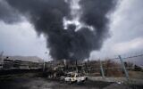 Illustrative: A thick plume of smoke rises from an oil storage facility in Tehran, Iran, after it was hit by an airstrike amid the US-Israeli bombing campaign against the Islamic Republic, March 8, 2026. (AP Photo/Vahid Salemi)
