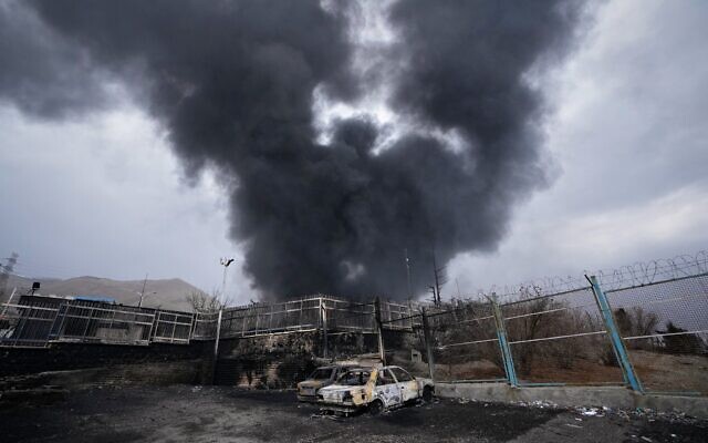 Illustrative: A thick plume of smoke rises from an oil storage facility in Tehran, Iran, after it was hit by an airstrike amid the US-Israeli bombing campaign against the Islamic Republic, March 8, 2026. (AP Photo/Vahid Salemi) Illustrative: A thick plume of smoke rises from an oil storage facility in Tehran, Iran, after it was hit by an airstrike amid the US-Israeli bombing campaign against the Islamic Republic, March 8, 2026. (AP Photo/Vahid Salemi)