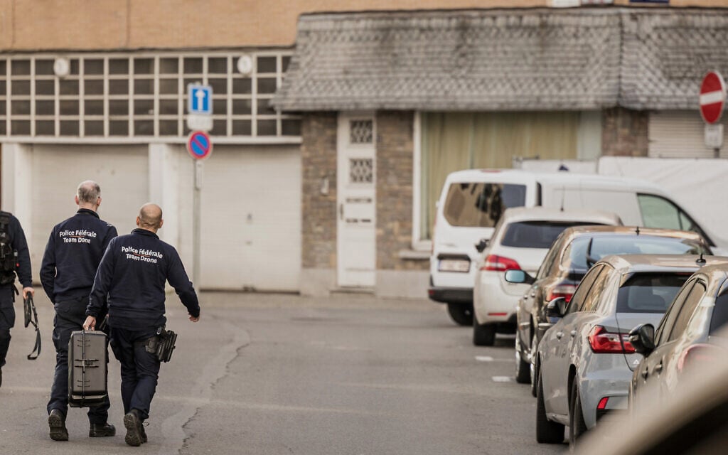 Police work in a secured area after a blast outside a synagogue, in Liege, Belgium, March 9, 2026. (AP Photo/Valentin Bianchi) Police work in a secured area after a blast outside a synagogue, in Liege, Belgium, March 9, 2026. (AP Photo/Valentin Bianchi)