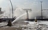 Illustrative: This image released by Bahrain's Interior Ministry shows firefighters extinguishing flames after an Iranian projectile struck an industrial area in Ma'ameer, Bahrain, Monday, March 9, 2026. (Bahrain Interior Ministry via AP)