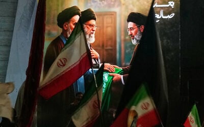 Protesters in Baghdad wave Iranian flags and hold a portrait of Iran's late supreme leader ayatollah Ali Khamenei and his son Mojtaba Khamenei to support his selection as the new supreme leader, March 9, 2026. (AP Photo/Hadi Mizban) Protesters in Baghdad wave Iranian flags and hold a portrait of Iran's late supreme leader ayatollah Ali Khamenei and his son Mojtaba Khamenei to support his selection as the new supreme leader, March 9, 2026. (AP Photo/Hadi Mizban)