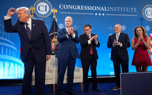 President Donald Trump looks to the crowd as Rep. Tom Emmer, R-Minn., House Speaker Mike Johnson of La.,, Rep. Steve Scalise, R-La., and Rep. Lisa McClain, R-Mich., applaud at the Republican Members Issues Conference, Monday, March 9, 2026, at Trump National Doral Miami in Doral, Fla. (AP Photo/Mark Schiefelbein) President Donald Trump looks to the crowd as Rep. Tom Emmer, R-Minn., House Speaker Mike Johnson of La.,, Rep. Steve Scalise, R-La., and Rep. Lisa McClain, R-Mich., applaud at the Republican Members Issues Conference, Monday, March 9, 2026, at Trump National Doral Miami in Doral, Fla. (AP Photo/Mark Schiefelbein)