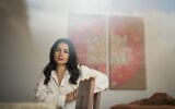 Iranian American influencer Zoya Biglary poses for photos in Los Angeles, on March 10, 2026. (AP Photo/Jae C. Hong)