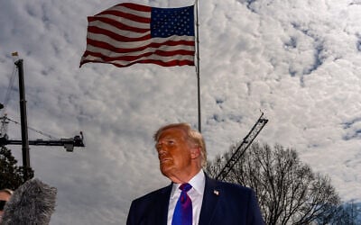US President Donald Trump speaks with reporters before departing on Marine One from the South Lawn of the White House, on March 11, 2026, in Washington, DC. (AP/Alex Brandon)