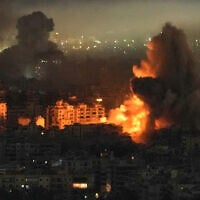 Smoke and flames rise from buildings following an Israeli airstrike on a Hezbollah target in Dahiyeh, Beirut's southern suburbs, Lebanon, March 11, 2026. (AP Photo/Bilal Hussein)