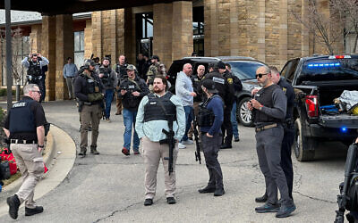 Law enforcement respond to a call at Temple Israel synagogue, March 12, 2026, in West Bloomfield Township, Michigan. (AP Photo/Corey Williams)