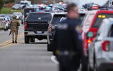 Law enforcement respond to Temple Israel synagogue in West Bloomfield Township, Michigan, March 12, 2026. (AP Photo/Paul Sancya)