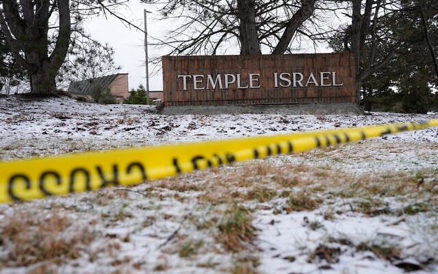 Police tape hangs outside the Temple Israel synagogue March 13, 2026, in West Bloomfield Township, Michigan. (AP/Paul Sancya)
