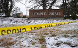 Police tape hangs outside the Temple Israel synagogue March 13, 2026, in West Bloomfield Township, Michigan. (AP/Paul Sancya)