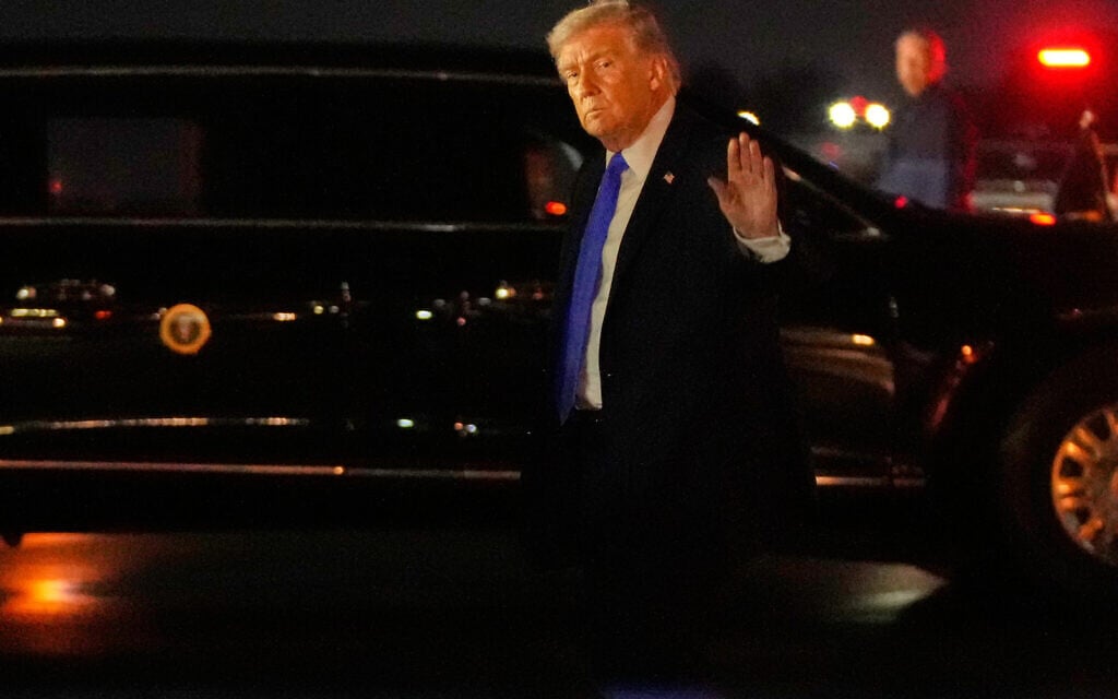 Trump threatens further strikes on Iran’s key oil export hub as war enters third week