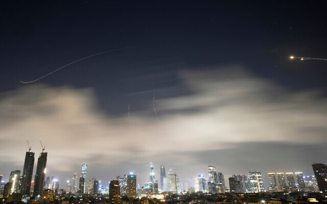 Israeli air defense system fires to intercept missiles during an Iranian attack over Tel Aviv, Israel, March 15, 2026. (AP Photo/Ohad Zwigenberg) Israeli air defense system fires to intercept missiles during an Iranian attack over Tel Aviv, Israel, March 15, 2026. (AP Photo/Ohad Zwigenberg)