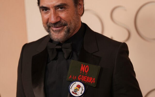 Javier Bardem arrives at the Oscars wearing 'No to war' and Handala pins on March 15, 2026, at the Dolby Theatre in Los Angeles. (AP Photo/Gregory Bull) Javier Bardem arrives at the Oscars wearing 'No to war' and Handala pins on March 15, 2026, at the Dolby Theatre in Los Angeles. (AP Photo/Gregory Bull)